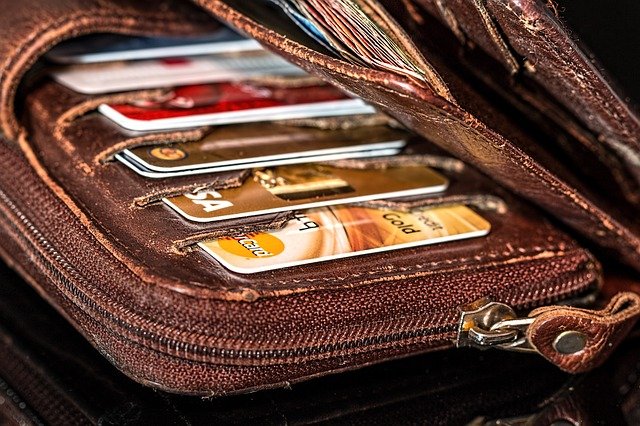 Image of a wallet filled with credit cards, representing how Harwood Legal, PLLC can help you understand and navigate the effects of bankruptcy in WV. 