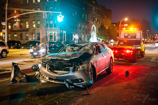 An image of a car wreck, representing how a Logan County car wreck lawyer at Harwood Legal PLLC provides legal guidance and representation to maximize your compensation.