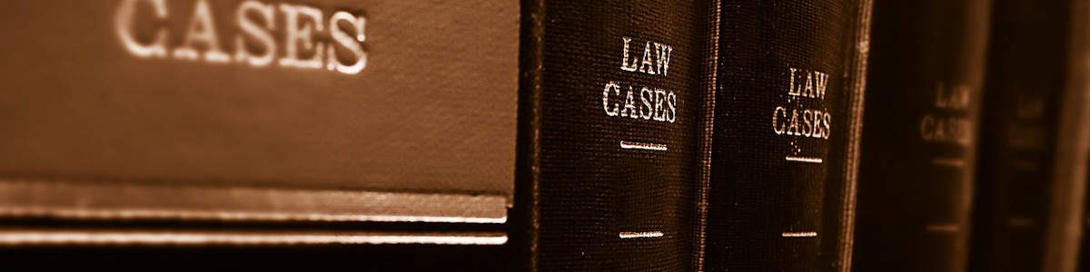 Image of law books representing the insurmountable amount of legal information that a person would normally have to search through when they have legal questions; however, Harwood Legal provides easy-to-understand answers in its legal resources for Southern WV.