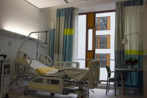 Image of an empty hospital bed, representing the need to consult Logan County personal injury lawyer Jason Harwood of Harwood Legal for experienced representation in personal injury cases in WV.